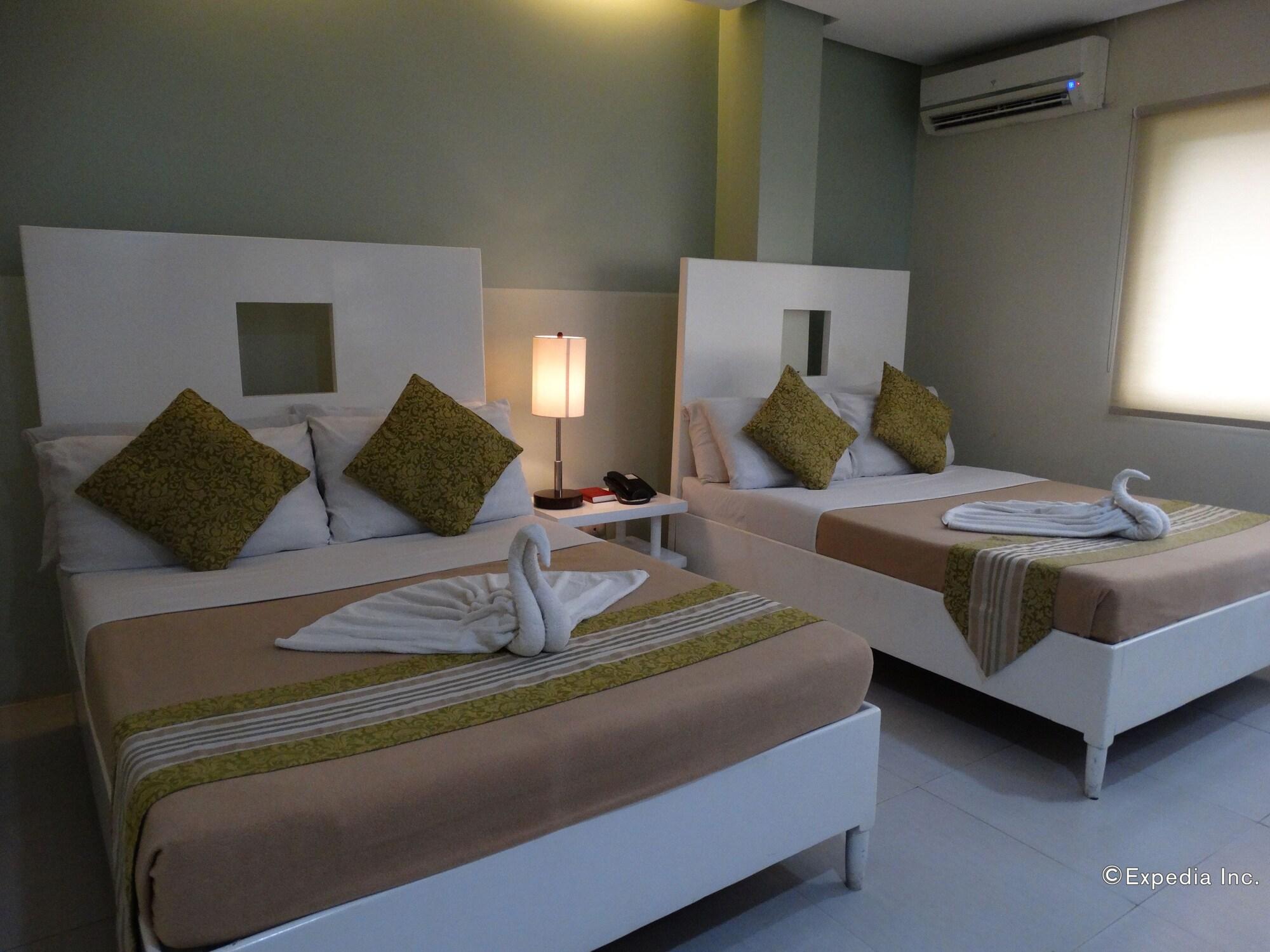 Empire Suites Hotel Puerto Princesa Exterior photo