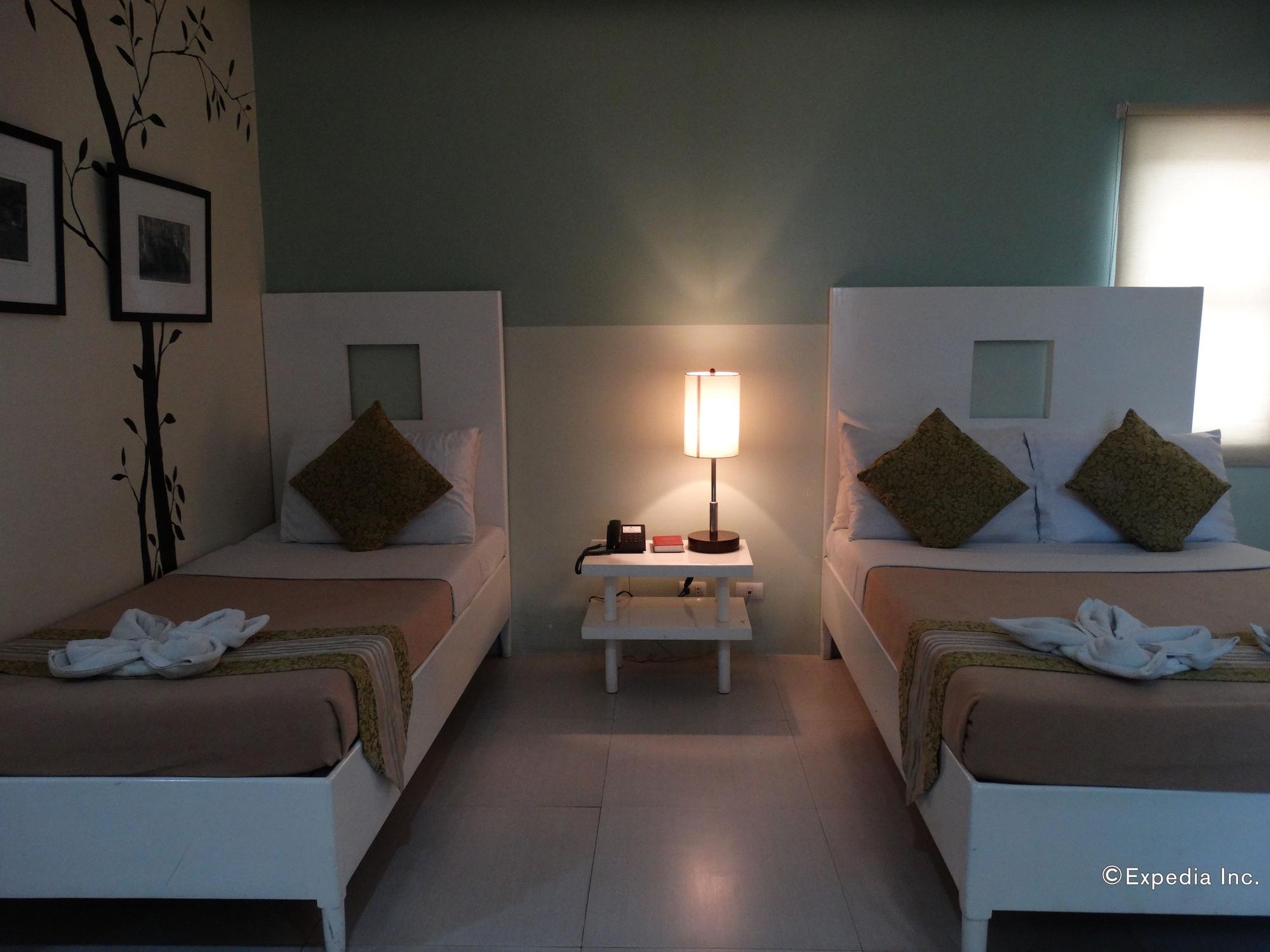 Empire Suites Hotel Puerto Princesa Exterior photo