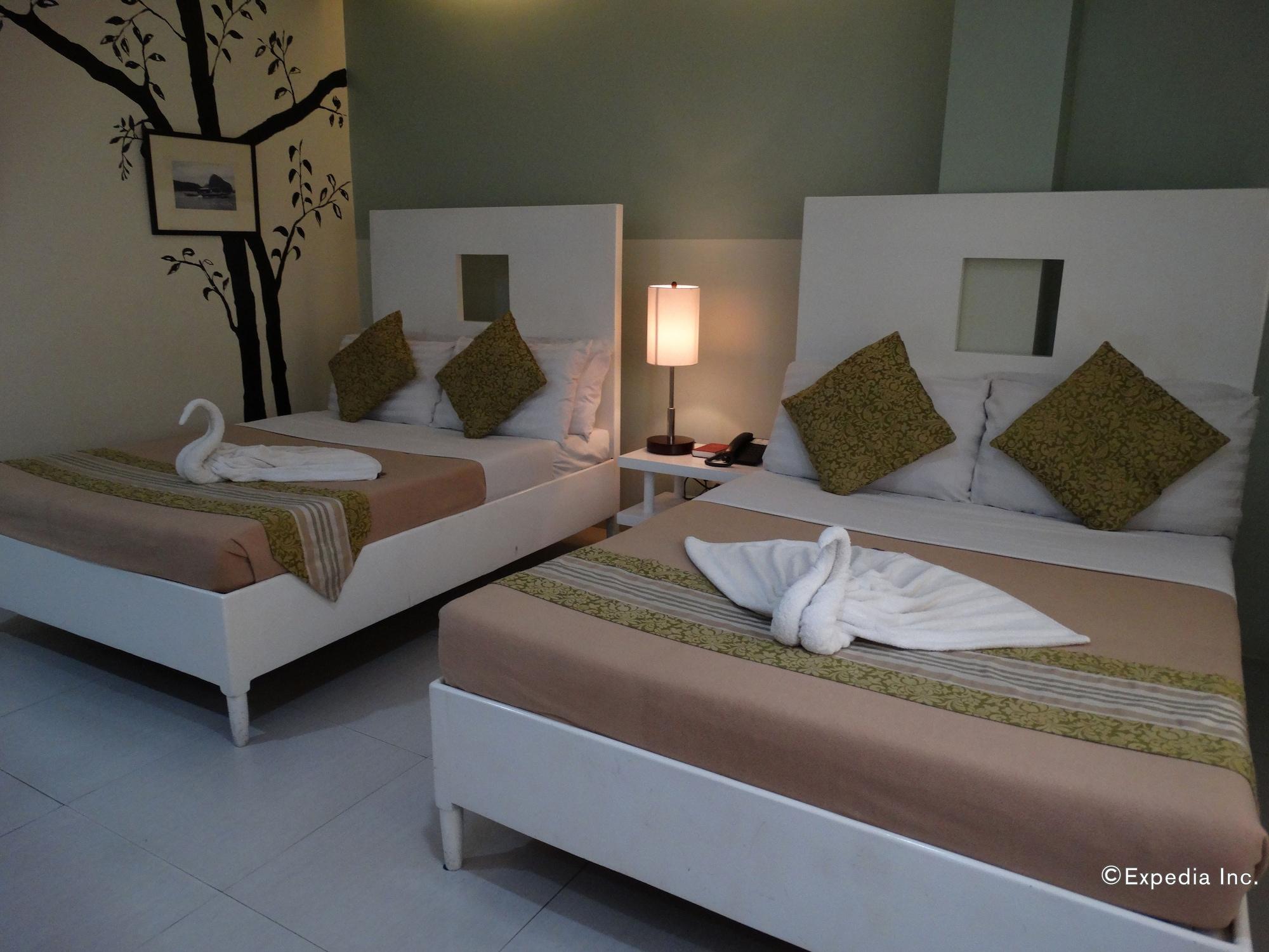 Empire Suites Hotel Puerto Princesa Exterior photo
