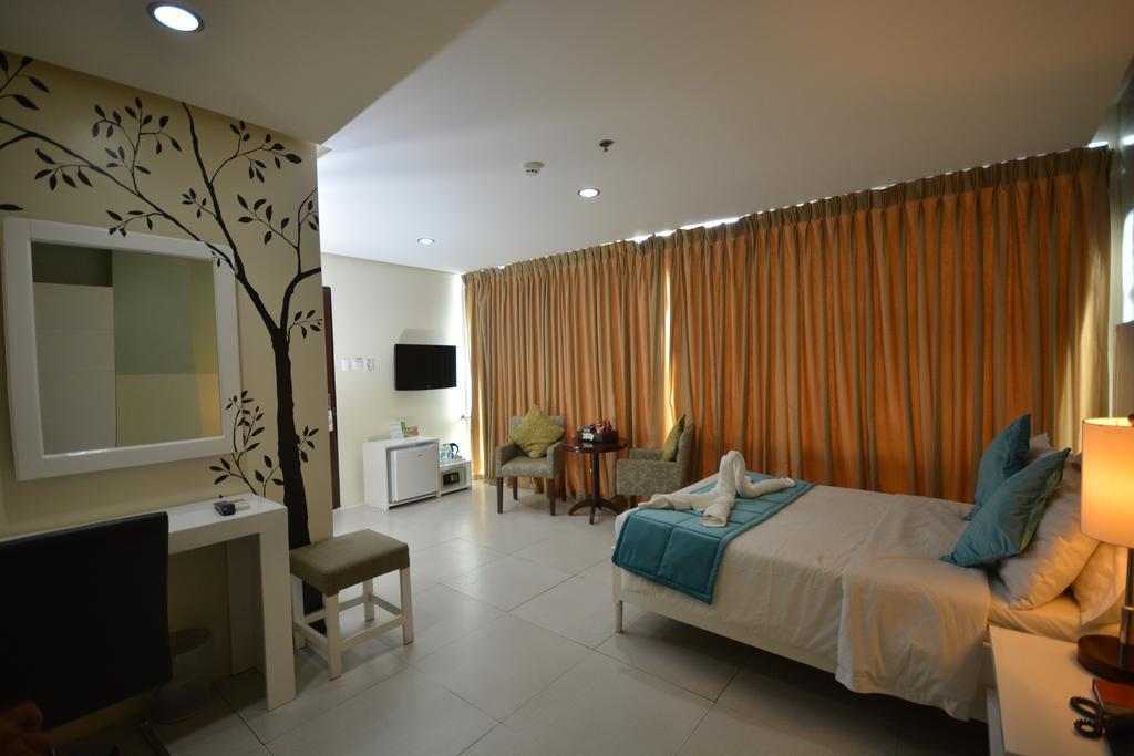 Empire Suites Hotel Puerto Princesa Exterior photo