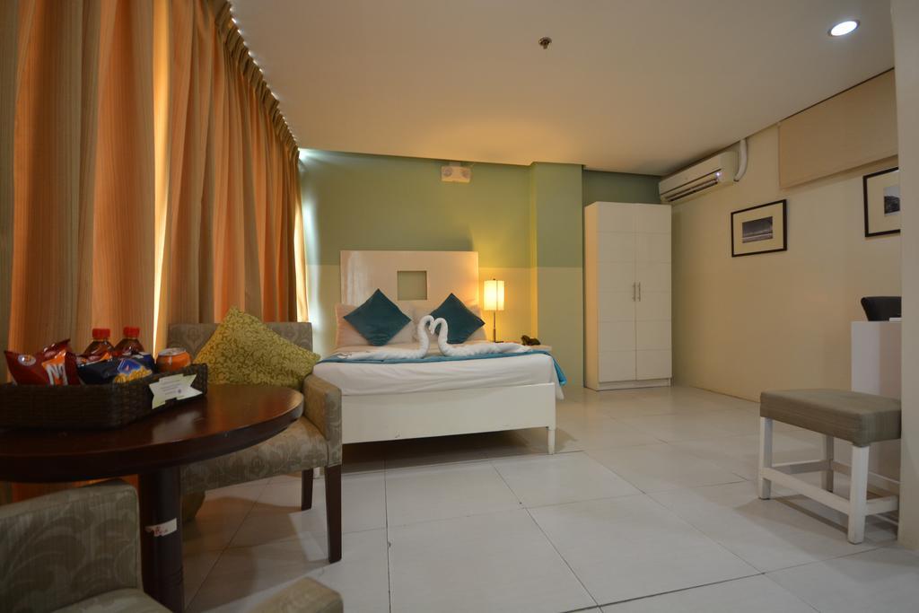 Empire Suites Hotel Puerto Princesa Exterior photo