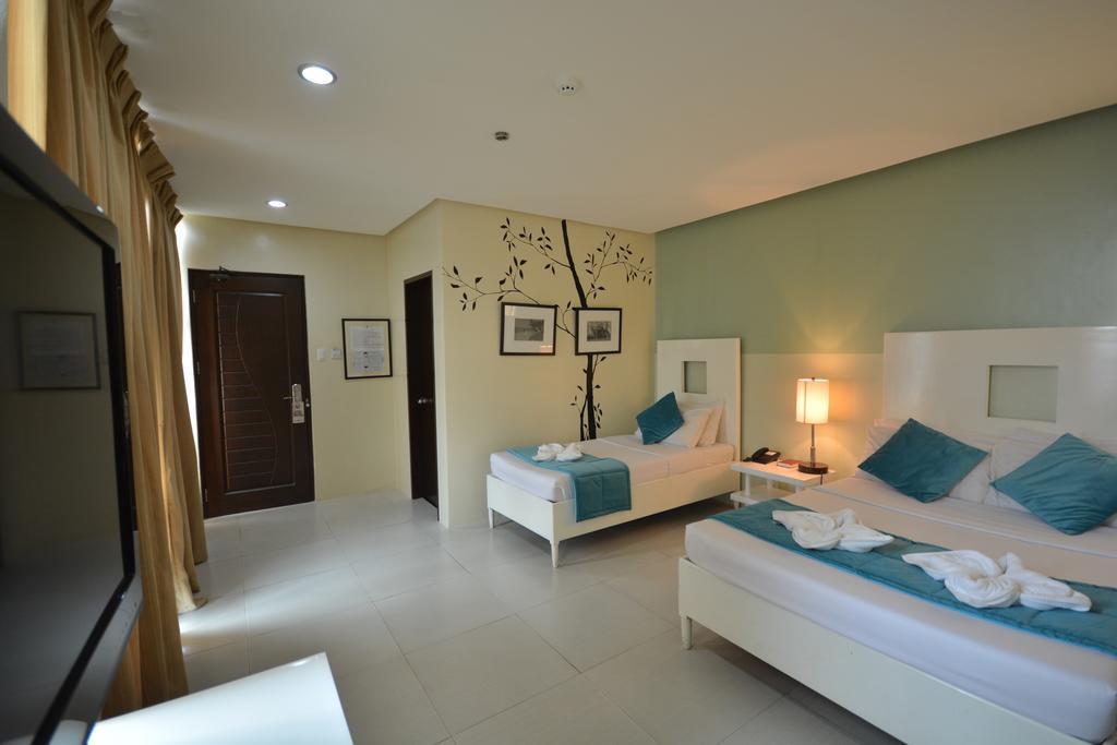 Empire Suites Hotel Puerto Princesa Exterior photo