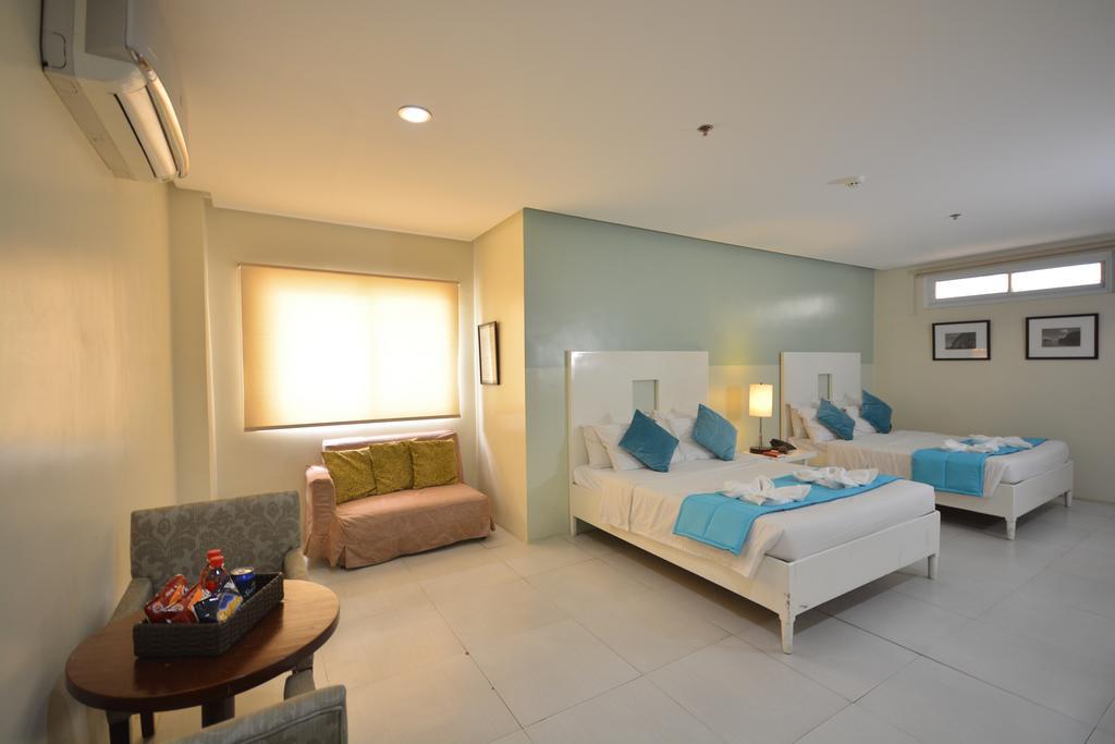 Empire Suites Hotel Puerto Princesa Exterior photo
